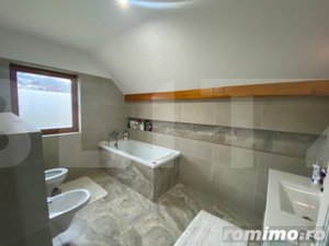 Casa eleganta cu 5 dormitoare, living, 2 bucatarii si 3 bai - imagine 10