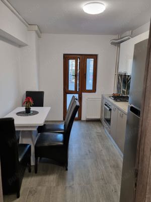 inchiriez apartament in regim hotelier zona centrala 3 camere doua bai  300 lei  - imagine 3