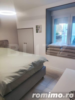 Apartament 3 camere, 3 bai, mobilat modern, zona centrala - imagine 2