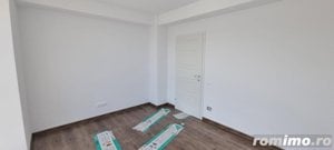 Apartament finisat cu 3 camere,55 mp,incalzire in pardoseala,zona Terra - imagine 3