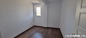 Apartament finisat cu 3 camere,55 mp,incalzire in pardoseala,zona Terra - imagine 4