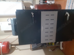 Centrala pe lemne Bosh cu gazeificare.  Foarte bună, economică, arată impecabil. 