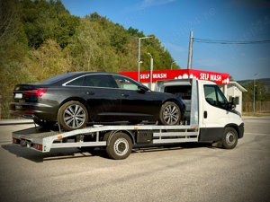 Tractari auto platforma asistenta rutiera