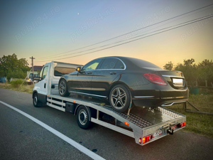 Tractari auto platforma asistenta rutiera