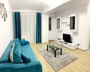 Închiriez regim hotelier apartament cu două camere decomsndate Militari  - imagine 5