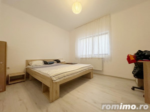 Apartament 2 camere, 49mp utili, balcon 8mp, gradina 102mp, în zona Giroc - imagine 3