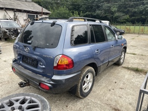 Dezmembrez Hyundai Santa Fe I 2.0 CRDi 4WD 84kW 113CP E3 an 2002 - imagine 8