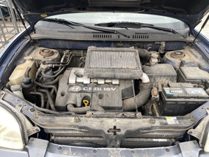 Dezmembrez Hyundai Santa Fe I 2.0 CRDi 4WD 84kW 113CP E3 an 2002 - imagine 7