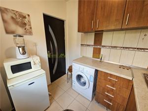 Garsoniera renovata in zona linistita Racadau - imagine 7