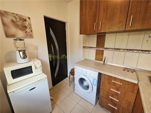 Garsoniera renovata in zona linistita Racadau - imagine 13