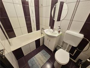 Garsoniera renovata in zona linistita Racadau - imagine 8