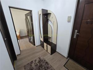 Garsoniera renovata in zona linistita Racadau - imagine 11