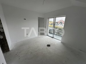 Casa insiruita de vanzare 120 utili 4 camere curte in Sura Mare Sibiu - imagine 4