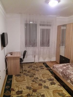 Închiriez o camera la un apartament cu 3 camere. - imagine 9 Închiriez o camera la un apartament cu 3 camere. - imagine 9