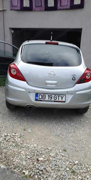 Opel Corsa Automat 2012 - imagine 4