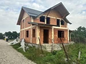 Casa la rosu de vanzare in Gheraiesti Bacau - imagine 2