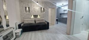 Apartament cu 2 camere nou, tip studio ,zona Coresi - imagine 2