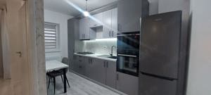 Apartament cu 2 camere nou, tip studio ,zona Coresi - imagine 5