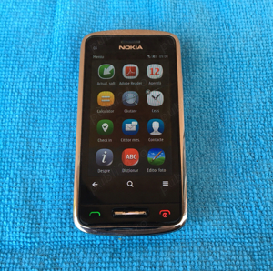 Nokia C6-01 in stare de functionare cu o fisura pe ecran codat orange - imagine 7