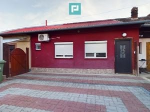 Apartament la curte comună cu terasă pavată!