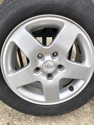 Set Jante Aliaj 15', Mazda, cu Anvelope M+S și Prezoane - ca noi - imagine 2