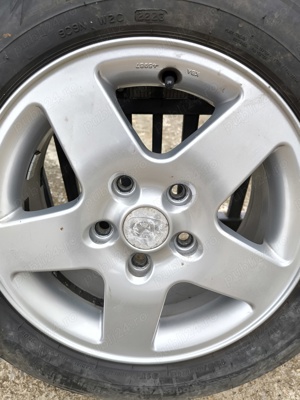 Set Jante Aliaj 15', Mazda, cu Anvelope M+S și Prezoane - ca noi - imagine 6