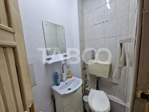 Apartament 4 camere spatiu comercial garaj si pivnita central Sibiu - imagine 9