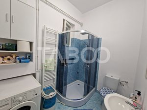 Apartament 4 camere spatiu comercial garaj si pivnita central Sibiu - imagine 7