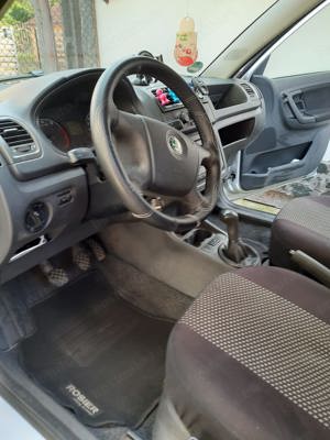 Skoda Fabia 1.2 HTP 2009 - imagine 8