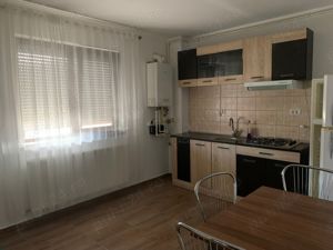 Închiriez apartament cu 3 camere - imagine 9