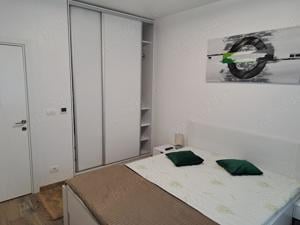 Proprietar, inchiriez apartament nou doar pe termen lung - imagine 2