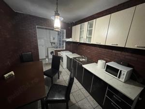 Vând Apartament 4camere,confort 1 sporit,etaj I,în centru Bacăului - imagine 2