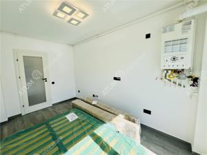 Apartament la parter cu 3 camere decomandate 2 bai zona Dna Stanca - imagine 5