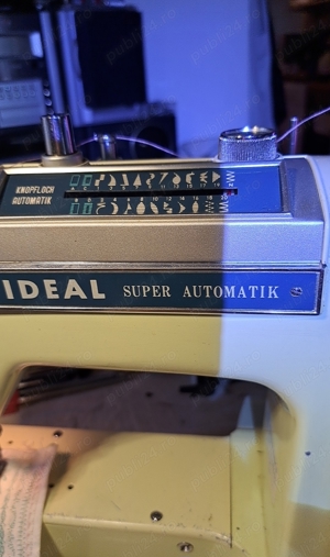 vînd mașina de cusut 