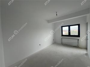 Apartament de 3 camere 2 bai si 2 balcoane la etajul 2 zona Piata Cluj - imagine 6