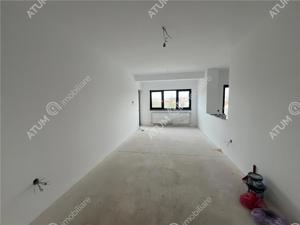 Apartament de 3 camere 2 bai si 2 balcoane la etajul 2 zona Piata Cluj - imagine 3