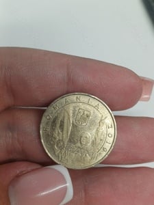 Vând moneda cu revoluția romana din  decembrie 1989 