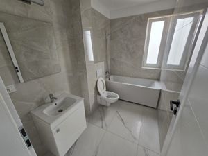 Apartament 2 camere. Bucatarie inchisa. Terasa 18 mp. - imagine 11