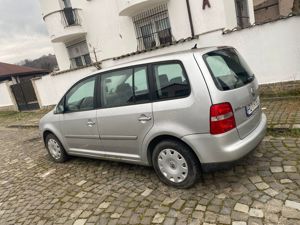 Vand   schimb  vw touran 2006 de 140cp putin rulat - imagine 2