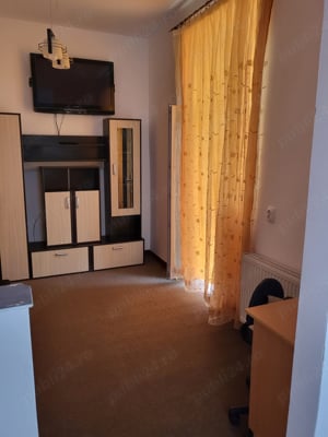 Vând apartament cu o cameră, situat la parter