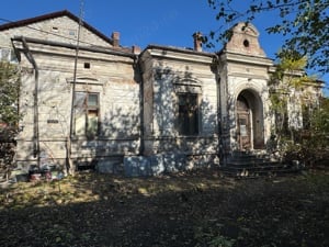 vand teren cu casa din 1940