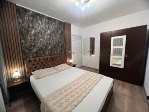 Inchiriez in regim hotelier Apartament 3 camere compus din 2 dormitoare + living - imagine 3