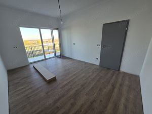 Apartament 2 camere. Decomandat. Terasa mare. Etaj 1. Asfalt. Bloc nou - imagine 2