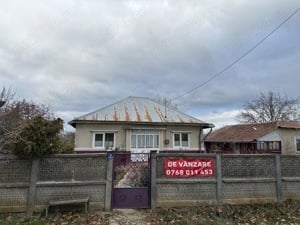 Teren si casa batraneasca de vanzare