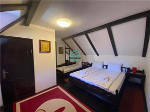 VAND PENSIUNE CU 7 CAMERE IN SIGHISOARA LA 800 MP DE CETATE - imagine 9