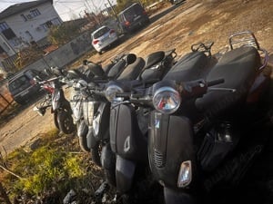 Rent a scooter   scutere pentru inchiriat 