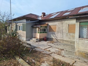 Casa+teren in com.Potigrafu deschidere 26m