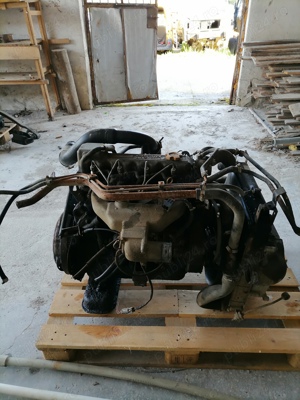 motor nissan eco t 100 - imagine 4