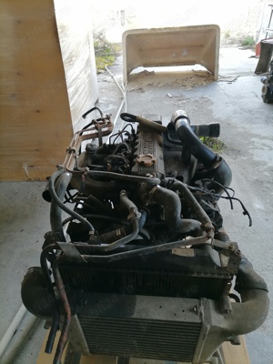 motor nissan eco t 100 - imagine 3