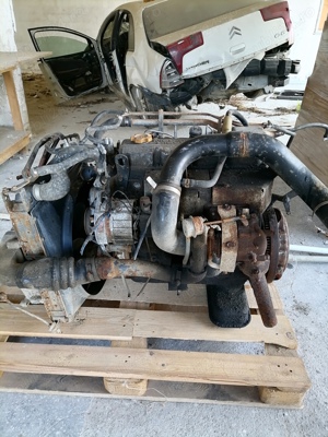 motor nissan eco t 100